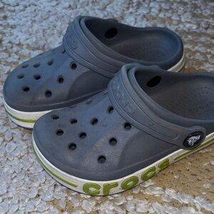 CROCS Kids' Dark Gray Clogs with Green Accents